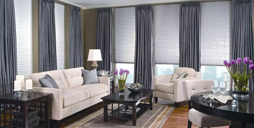 Combination of window blinds and drapes